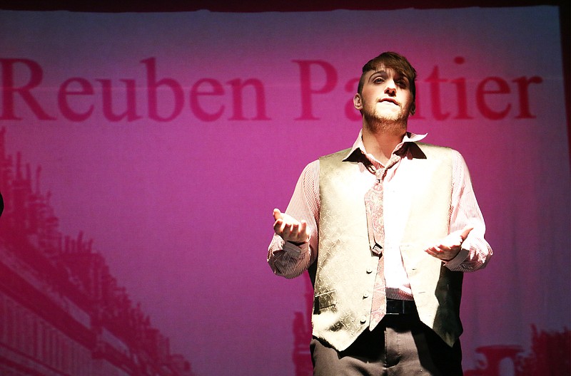 Reuben Pantier, played by Jonathan Meyer, introduces his character during a performance of "Spoon River Anthology" at William Woods University. 