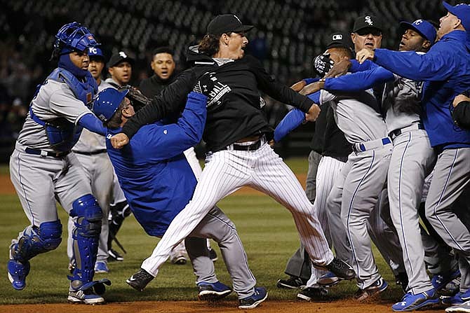 Chicago White Sox's Jeff Samardzija, center, fights with Kansas City Royals players during the seventh inning of a baseball game Thursday, April 23, 2015, in Chicago. 