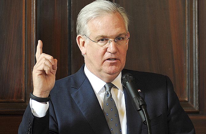 In this Feb. 12, 2015 file photo, Gov. Jay Nixon addresses members of the media following the annual Missouri Press Association luncheon at the governor's mansion.