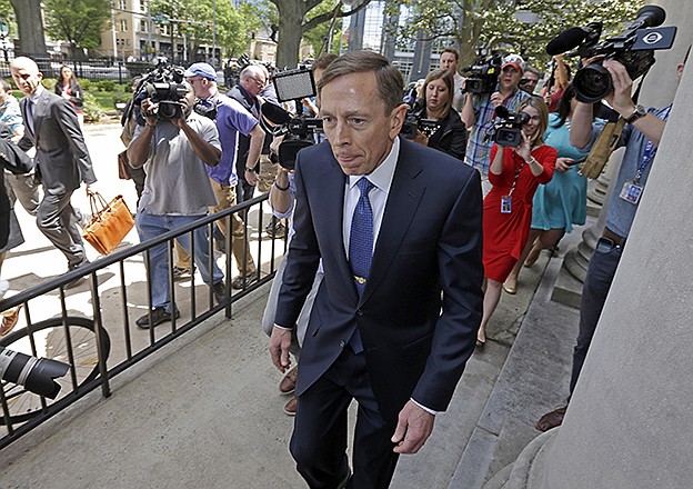 Former CIA director David Petraeus, whose career was destroyed by an extramarital affair with his biographer, arrives for sentencing at the federal courthouse Thursday in Charlotte, North Carolina.
