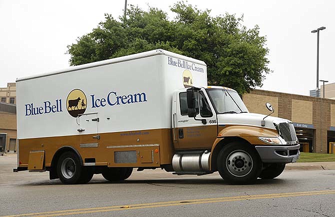 A Blue Bell Ice Cream truck stops at Walgreens in Dallas on Thursday morning, April 23, 2015. Texas-based Blue Bell Creameries recalled all its products this week after listeria was found in a variety of the company's frozen treats. Listeria is a hardy bacteria found in soil and water that can be tracked into a plant or carried by animals. (David Woo/The Dallas Morning News via AP)