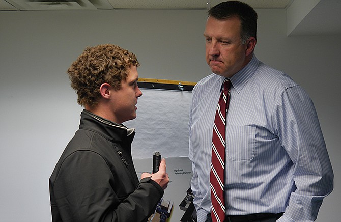 Ben Nuell, a student reporter from radio station KXCV, chats with Maryville R-2 Superintendent Larry Linthacum about the construction of a new performing arts center for the district. Linthacum was hired by the Jefferson City Board of Education in December 2014 to replace outgoing Superintendent Brian Mitchell, starting July 1, 2015.