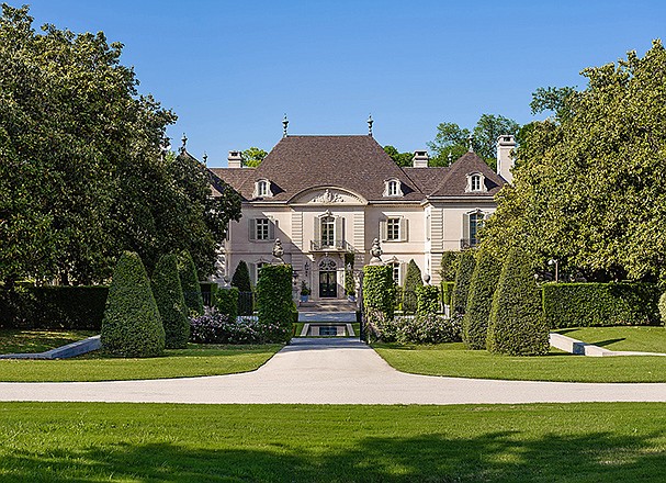 This undated photo provided by Christie's International Real Estate shows an exterior view of Walnut Place, a $100 million estate on the market in Dallas. Billionaires are increasingly willing to pay $100 million for homes that can serve as showcases for their fortunes, according to an analysis issued Thursday by Christie's International Real Estate.