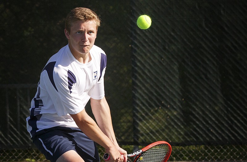 Helias' T.J. Hagenhoff sets up for a backhand during Thursday's dual match with Rolla at Washington Park.