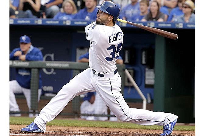 Kansas City Royals' Eric Hosmer hits a three-run home run during the first inning of a baseball game against the Cleveland Indians, Tuesday, May 5, 2015, in Kansas City, Mo. 