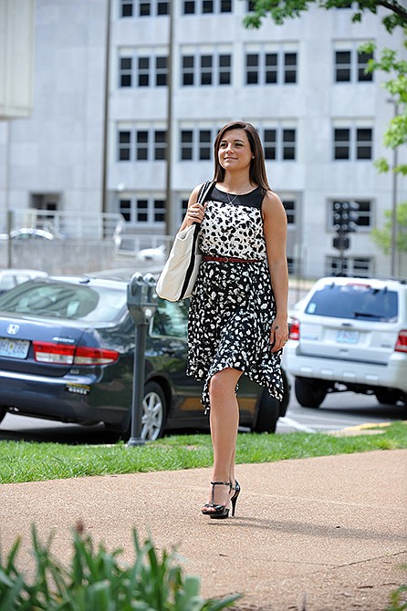 Jordin Hauck walks downtown in a business-professional dress - Simply Vera Vera Wang, Exotic Escape collection ($68) - available at Kohl's. The dress is paired with an Apt. 9 belt ($26, set of two) and a Jennifer Lopez handbag ($109). 