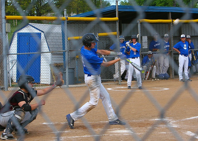 Alex Gerlach makes contact with a pitch during Jamestown's 5-3 win against Missouri Military Academy Friday, May 1. 