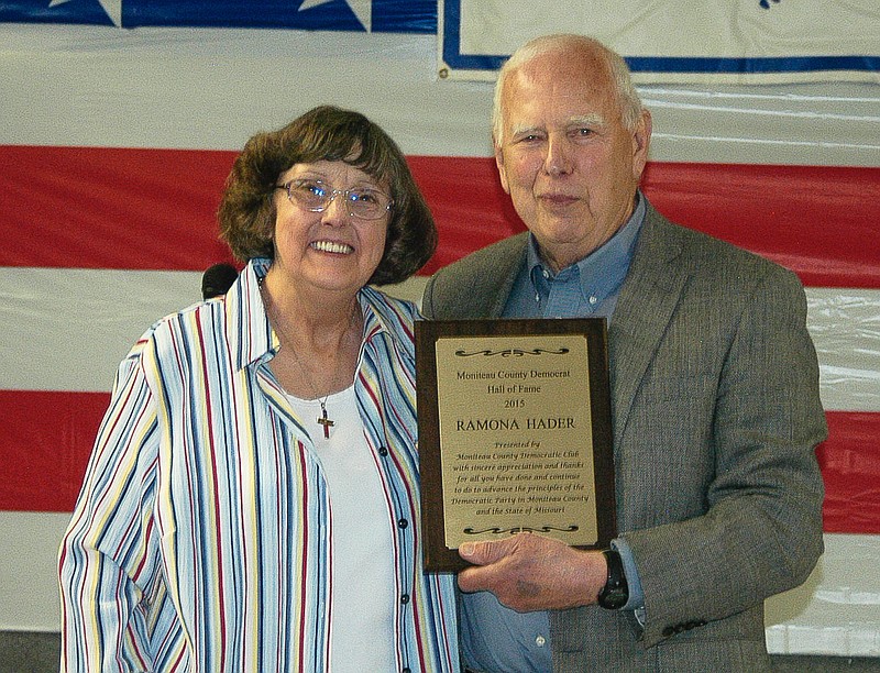 Ramona Hader is presented the plaque honoring her as the newest member of the Moniteau County Democrat Hall of Fame Friday, May 1, by Gail Hughes at the Truman Days dinner held at Centennial Hall at the fairgrounds.