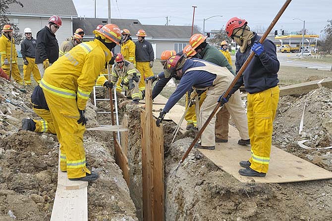 
Several members of the Jefferson City Fire Department participate in a trench collapse training earlier this year at JCFD Station 5 on Fairgrounds Road.