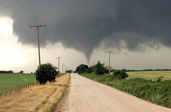 A tornado touches down in Cisco, Texas, on Saturday. One person was killed Saturday night and another left in critical condition after the tornado hit the rural farming and ranch area about 100 miles west of Fort Worth. 