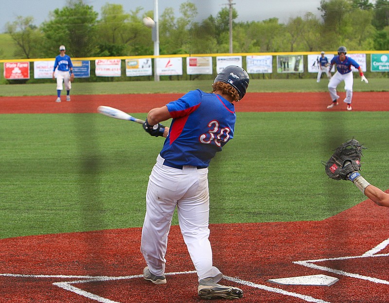 Hunter Heimericks singles to right field with Jaden Barr on first base Thursday, May 7.