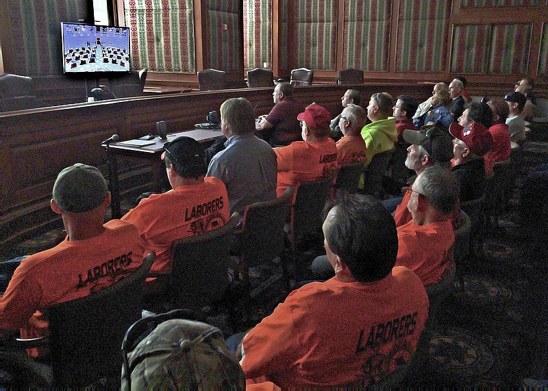 Members of labor unions in Missouri gathered in a hearing room to watch the broadcast of senate debate over so called "right-to-work legislation. A number of opponents and proponents were in the senate gallery to watch the day's debate.