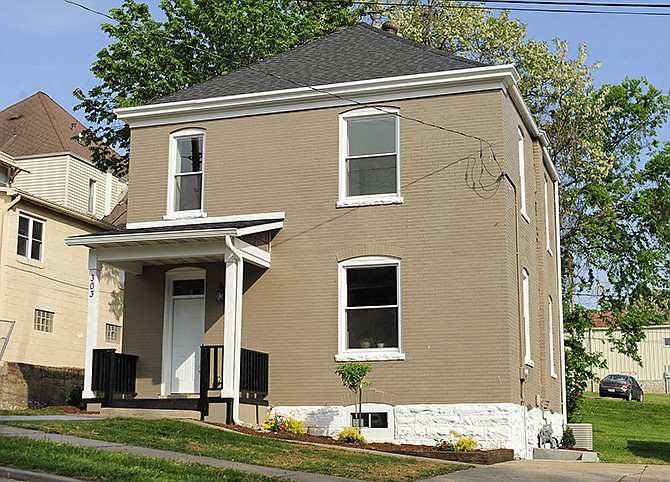 The century home at 303 Marshall St. was recently restored and received the May Golden Hammer award. Home to widows almost continually from 1909 to 1973, 303 Marshall St. has been dubbed the Widow's House. It is now owned by Ryan and Stacie Gilmore of Cameo Construction.