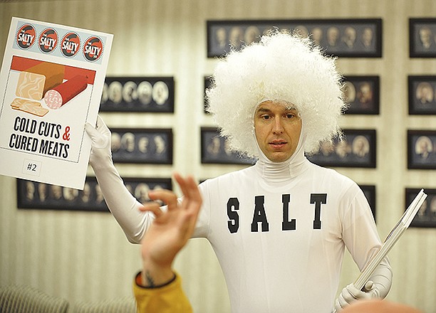Members of the Heart Walk Community Campaign received a visit from Sneaky Salt. Salt, also known as Stephen Hall, senior communications director for American Heart Association dressed in all white and wore a shirt with the word SALT spelled out on it. He led a game where contestants tried to guess how much sodium is in different foods. 