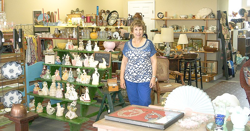 Owner Ana Hendrix in Oak Street Treasures, which offers a wide variety of antique and gift items.