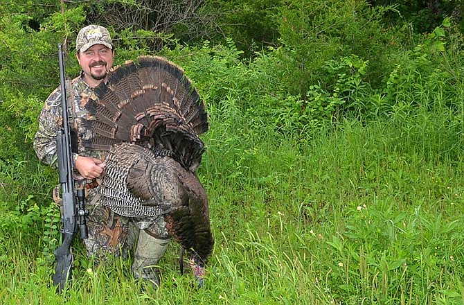 The Kansas Spring Turkey Season remains open until May 31. Brandon Butler poses with a gobbler taken on a recent trip across the state line. 