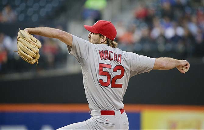 St. Louis Cardinals' Michael Wacha delivers a pitch during the first inning of a baseball game against the New York Mets on Tuesday, May 19, 2015, in New York.