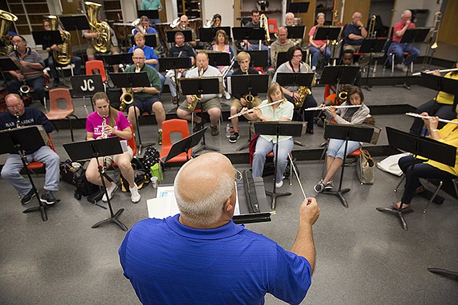 The Jefferson City Community Band practices for its upcoming Memorial Day concert in the Jefferson City High School band room. The concert will begin at 1 p.m. at the First Christian Church.