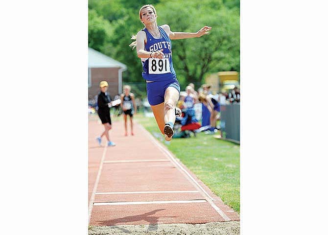 
Hannah Oberdiek of South Callaway leaps toward the
pit during the Class 2 girls long jump Friday at Dwight
T. Reed Stadium in Jefferson City.