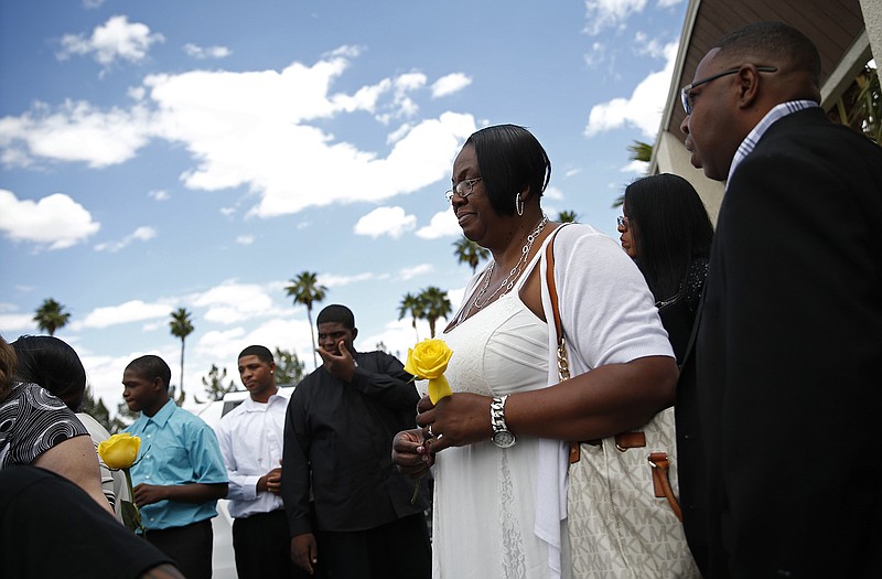Patty King leaves a memorial service for her father B.B. King Saturday in Las Vegas. Friends and family members gathered Saturday at a funeral home in Las Vegas to remember the Blues legend.