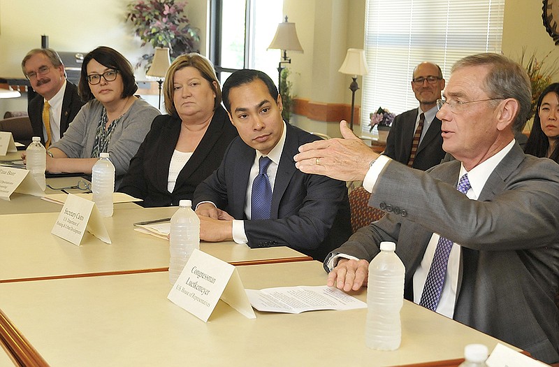 The Secretary of Housing and Urban Development Julian Castro, second from right, made a brief visit to Jefferson City Wednesday to participate in a roundtable discussion with Congressman Blaine Luetkemeyer, at right, and housing industry representatives. Seated from right to left, next to Castro is Tina Beer with the Missouri Housing Development Commission, Kelly Smith, River City Habitat for Humanity and Cole County Presiding Commissioner, Sam Bushman. 