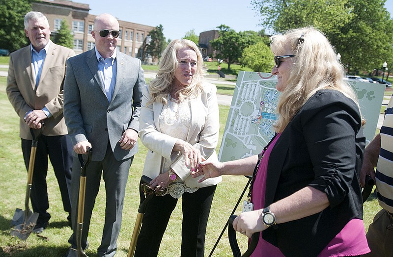 Sen. Jeanie Riddle, R-Mokane, shakes the hand of Fulton State Hospital COO Marty Martin-Forman at the end of a groundbreaking ceremony on Wednesday for the new mental health facility.