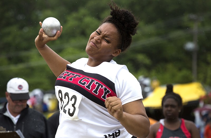 Alexis Roberson of Jefferson City finishes her wind up during the Class 5 girls shot put final Friday in the track and field champioships at Dwight T. Reed Stadium. 