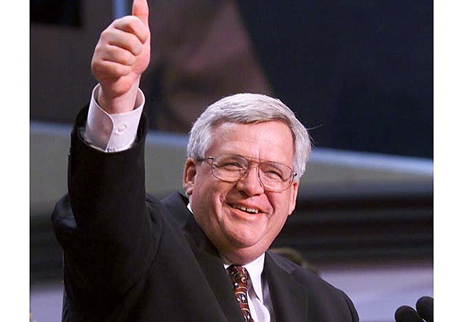 In this July 31, 2000 file photo, House Speaker Dennis Hastert of Ill. gives a thumbs up after taking over as chairman of the Republican National Convention in Philadelphia. Hastert's career as House speaker both arose and ended amid the sex-related scandals of others. Now, eight years after leaving Congress, Hastert's own legacy is threatened by an indictment charging financial misdeeds -- and cryptically referring to "misconduct" against an unnamed person.