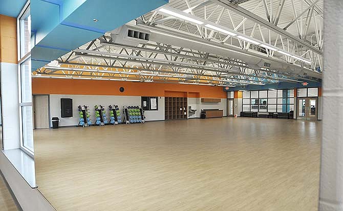 The expansion is nearly complete and ready for use at the West YMCA in Jefferson City. Shown
reflected in one of four large mirrors is the Group Exercise Room, which can host a
number of activities including yoga and Pilates.