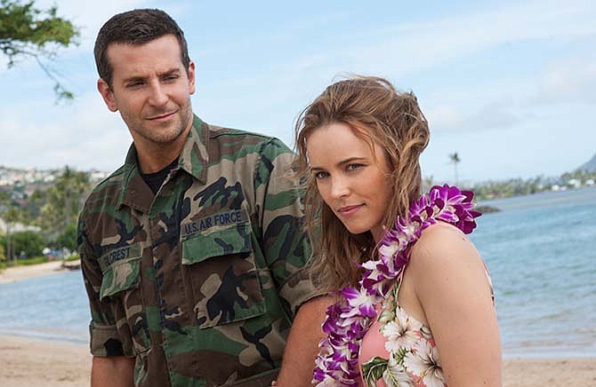 This photo provided by Sony Pictures Entertainment shows Bradley Cooper, left, and Rachel McAdams in a scene from Columbia Pictures' "Aloha." 