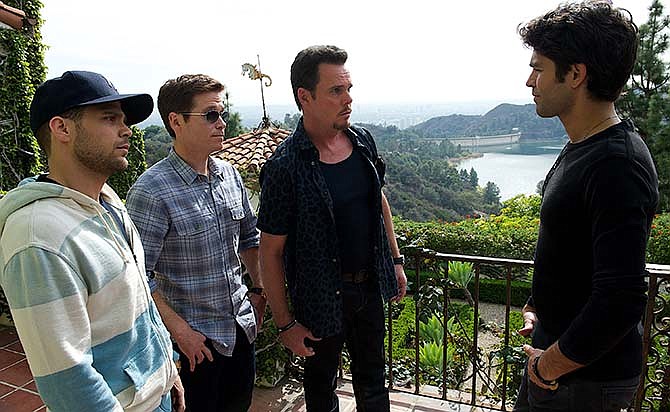 This photo provided by Warner Bros. Pictures shows, from left, Jerry Ferrara as Turtle, Kevin Connolly as Eric, Kevin Dillon as Johnny Drama and Adrian Grenier as Vince in Warner Bros. Pictures,' Home Box Office's and RatPac-Dune Entertainment's comedy "Entourage," a Warner Bros. Pictures release.