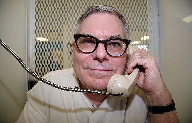 Texas death row inmate Lester Bower is photographed May 20, 2015, during an interview from a visiting cage at the Texas Department of Criminal Justice Polunsky Unit near Livingston, Texas. Bower was executed June 3, 2015, for the fatal shootings of four men at an airplane hangar north of Dallas in 1983.