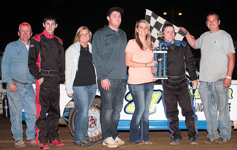 Derek Henson, Russellville, in the super stock victory lane Sunday night at Double-X Speedway.