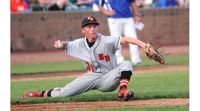 New Bloomfield junior reliever Clay Jensen stretches across the grass to make a throw after fielding a grounder in the fifth inning of the Wildcats' 7-1 loss to Valle Catholic in the Class 2 state championship Thursday night at T.R. Hughes Ballpark in O'Fallon, Mo.