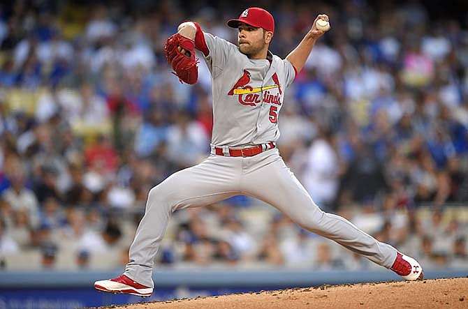 St. Louis Cardinals starting pitcher Jaime Garcia throws to the plate during the second inning of a baseball game against the Los Angeles Dodgers, Saturday, June 6, 2015, in Los Angeles.