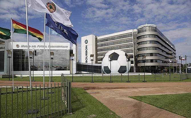 In this June 3, 2015 photo, CONMEBOL headquarters sits on a 100-acre complex and includes a museum, a five-star luxury hotel, a large convention center and heliport, in Asuncion, Paraguay. Nicolas Leoz, former president of the South American football confederation, lobbied Paraguay's Congress to approve a law in 1997 making the headquarters exempt from legal intervention.