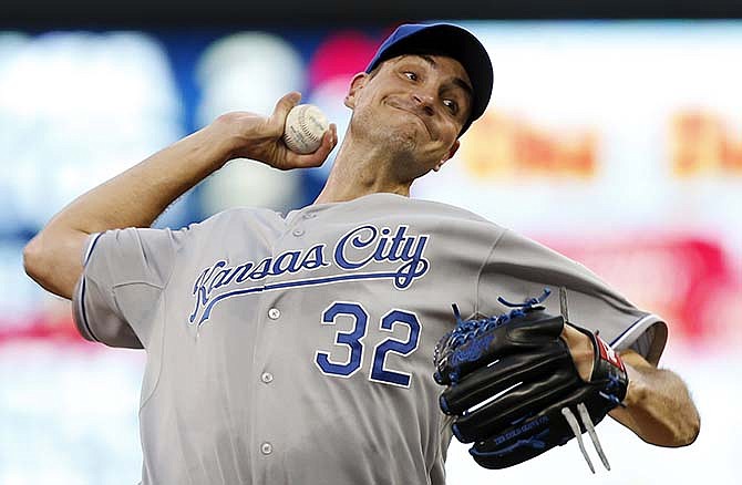 Kansas City Royals pitcher Chris Young throws against the Minnesota Twins during the first inning of a baseball game, Tuesday, June 9, 2015, in Minneapolis. 