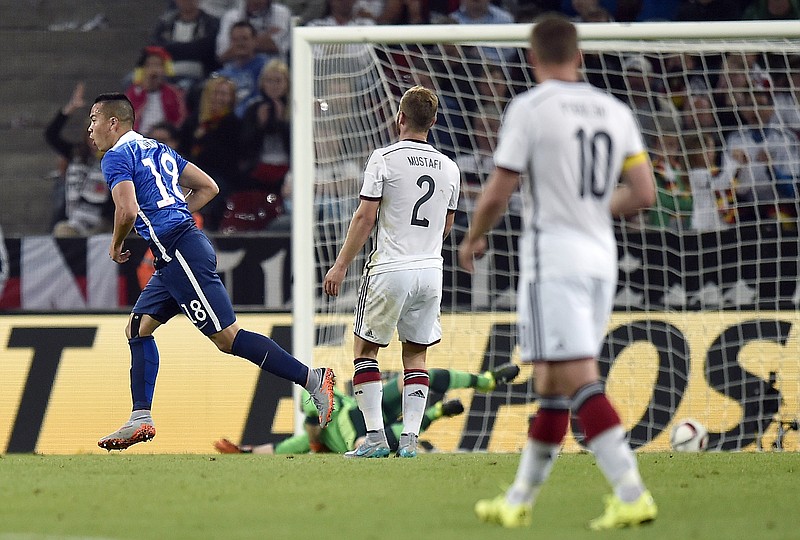 Bobby Wood of the United States celebrates after scoring a goal during Wednesday's match against Germany in Cologne, western Germany.