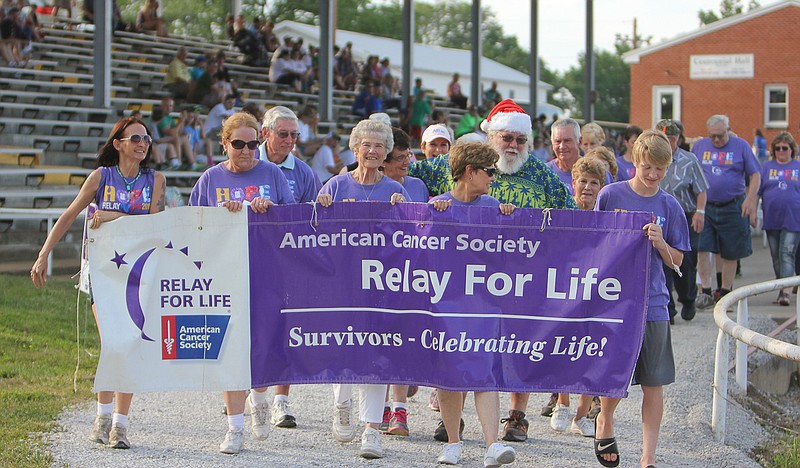 Cancer survivors led a lap around the Moniteau County Fairgrounds to kickoff Relay For Life 2015 on Friday June 12.