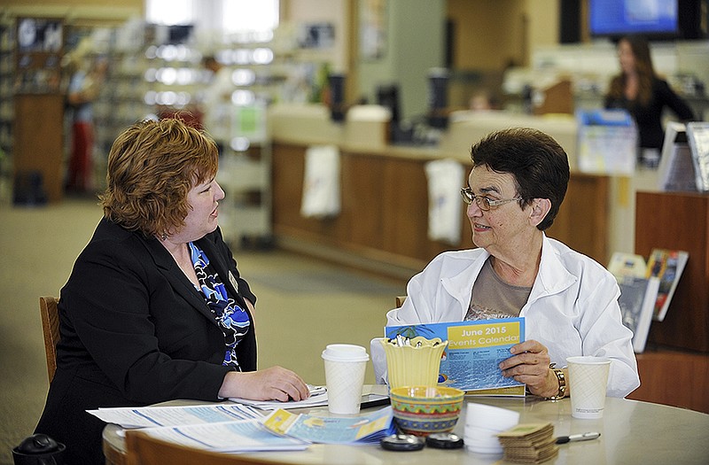 
Claudia Schoonover, left, director of the MIssouri River Regional Library, recently started 'Coffee with the Library Director' to gather feedback from patrons and the community at large. Rose Lineberry, a regular to the library, sat down to talk with Claudia Wednesday to learn her favorite things and what she might like to see added. This was the second time for the event at which she asked what users liked, would like to see and to ask them if they would fill out a survey.