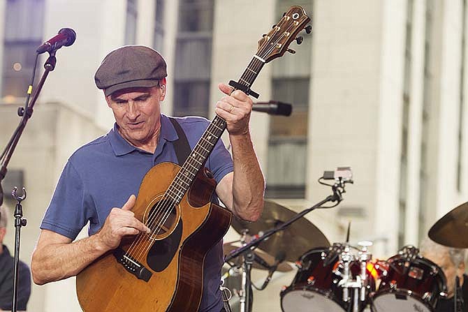 James Taylor performs on NBC's "Today" show during the Toyota Summer Concert Series on Monday, June 15, 2015, in New York. (Photo by Charles Sykes/Invision/AP)