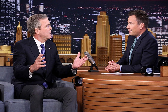 Former Gov. Jeb Bush, left, the new Republican presidential candidate, speaks during an interview with host Jimmy Fallon on "The Tonight Show Starring Jimmy Fallon," Tuesday in New York.  