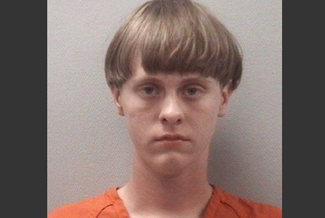 This April 2015 photo released by the Lexington County (S.C.) Detention Center shows Dylann Roof, 21. Charleston Police identified Roof as the shooter who opened fire during a prayer meeting inside the Emanuel AME Church in Charleston, S.C., Wednesday, June 17, 2015, killing several people. 