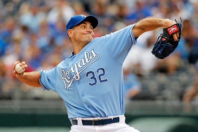 Kansas City Royals pitcher Chris Young throws in the first inning of a baseball game against the Boston Red Sox at Kauffman Stadium in Kansas City, Mo., Sunday, June 21, 2015.