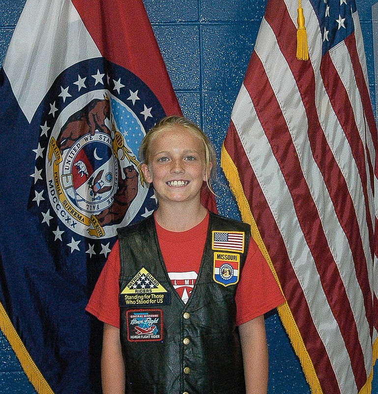 Zoey Lang, Boonville, was recognized at the Honor Flight Motorcycle Poker Run, Saturday, June 20, for her support and donations to the program. The fifth grade student makes craft and other items, sells them and donates the funds to the Central Missouri Honor Flight program. She received her first motorcycle ride to come to the event.