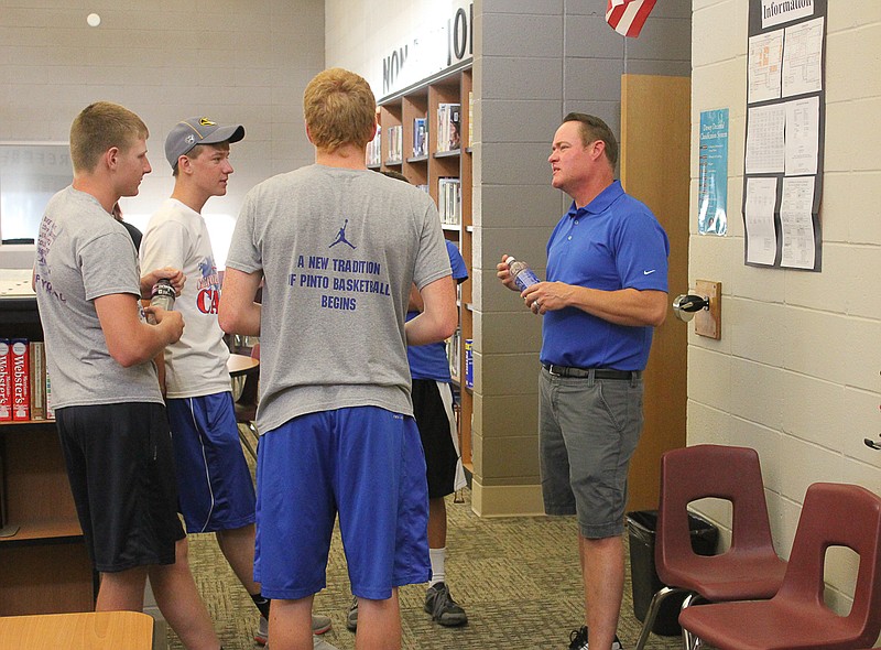 Newly hired coach Matt Moulder talks to California baseball and basketball athletes at the high school Friday evening.