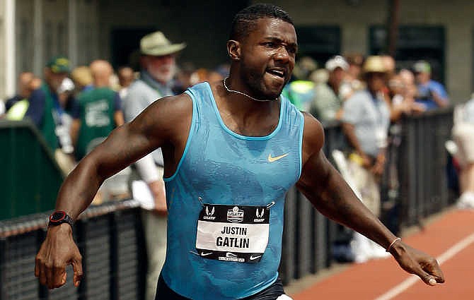 Justin Gatlin wins his preliminary heat of the 200-meter at the U.S. Track and Field Championships in Eugene, Ore., Saturday, June 27, 2015. 