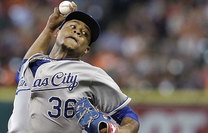 Kansas City Royals' Edinson Volquez delivers a pitch against the Houston Astros in the first inning of a baseball game Wednesday, July 1, 2015, in Houston.