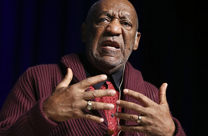 Comedian Bill Cosby performs at the 2013 Stand Up for Heroes event at Madison Square Garden, in New York. Cosby admitted in a 2005 deposition that he obtained Quaaludes with the intent of using them to have sex with young women. In court documents released Monday, he admitted giving the sedative to at least one woman. 