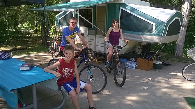 The Nichols family - from left, Campbell, Caleb and Heidi - enjoys taking their pop-up camper to state and national parks for weekends and vacations.